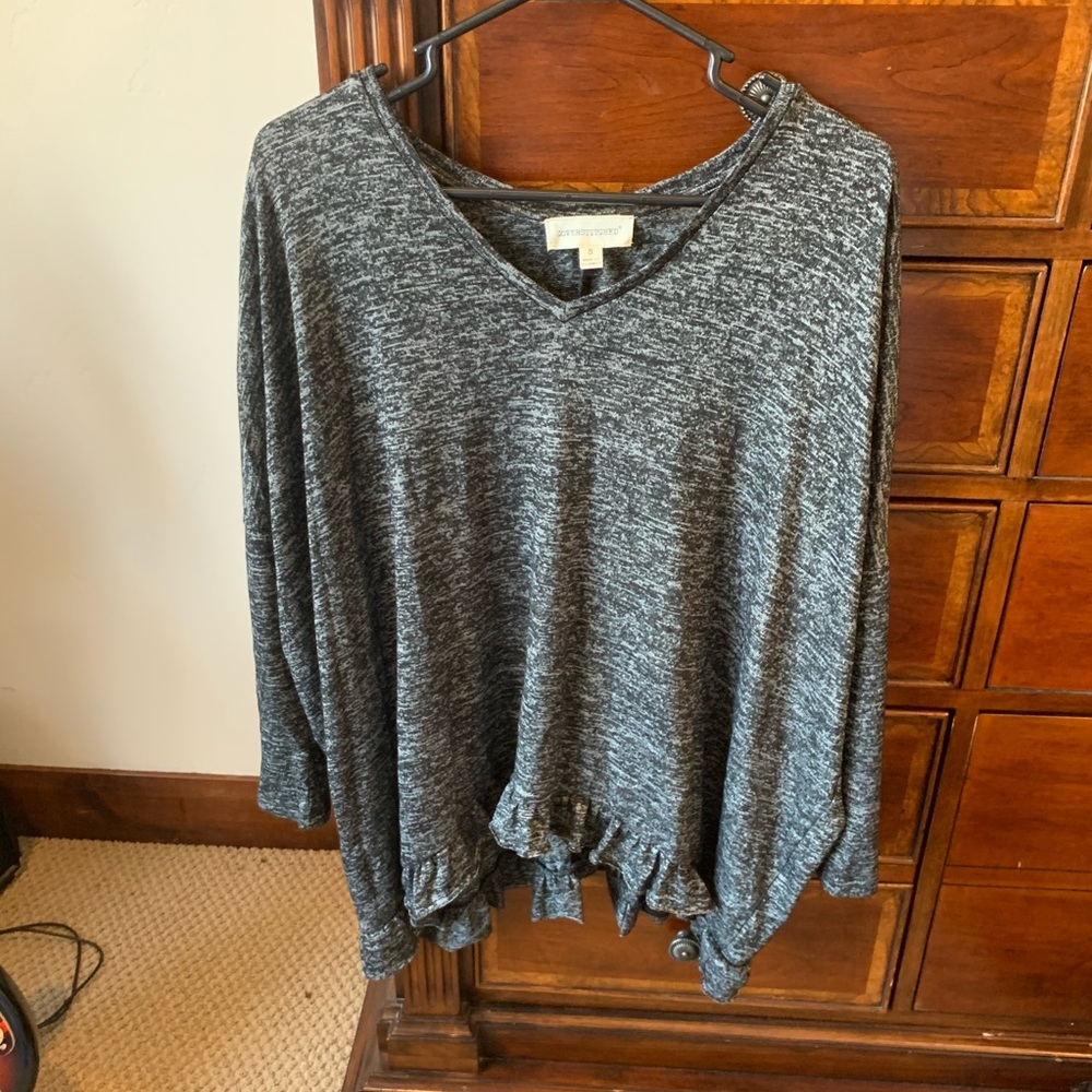 Charcoal grey slouchy blouse with ruffle bottom